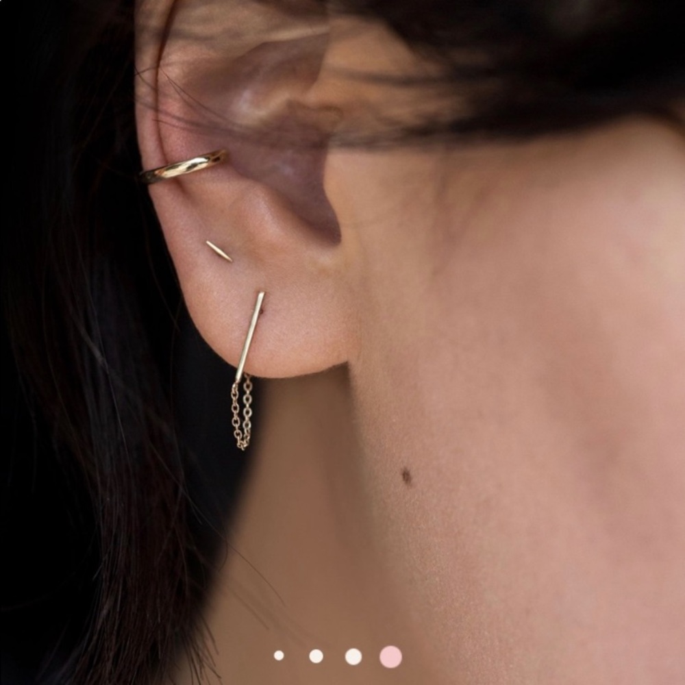 Single catbird ballerina earring.